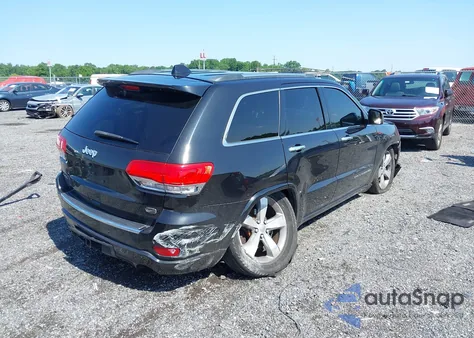 2014 Jeep Grand Cherokee Overland z USA, uszkodzony, nr VIN 1C4RJFCT5EC302709